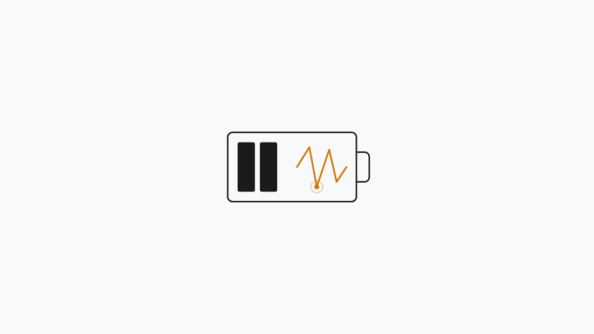Minimal flat editorial illustration of an Android smartphone battery cell with a jagged alert amber current discharge spike